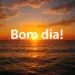 Nascer do sol sobre o mar com a frase 'Bom dia!' em destaque