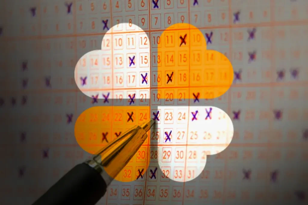 Lotofácil: A estratégia de equilibrar números pares e ímpares que aumenta suas chances em 40% 2 Caneta dourada aponta para datas marcadas com X em calendário de papel.