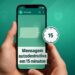Mão segurando celular com mensagem autodestrutiva no WhatsApp e cronômetro de 15 minutos